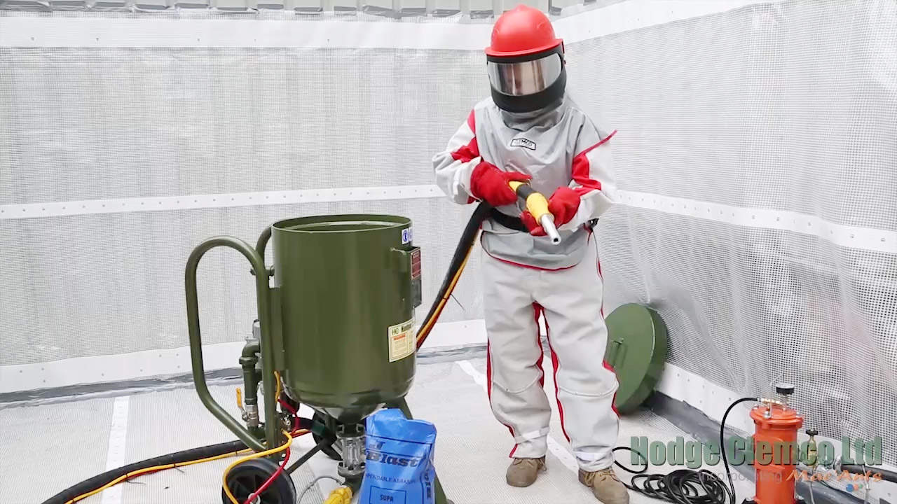 Blast Cleaning Appreciation Training 2040 blast system and blaster in full PPE